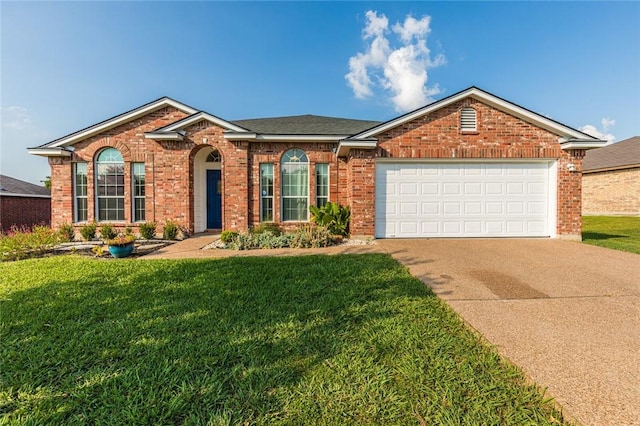 view of front facade featuring a garage and a front lawn