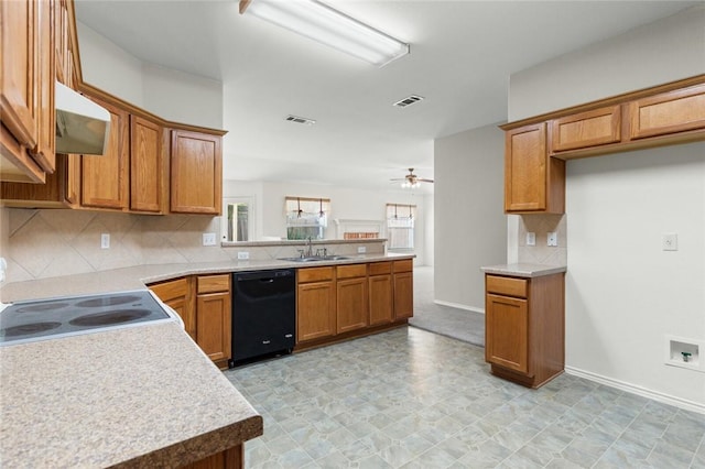 kitchen featuring dishwasher, exhaust hood, sink, ceiling fan, and tasteful backsplash