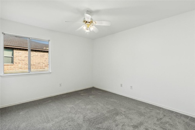 unfurnished room with carpet and ceiling fan