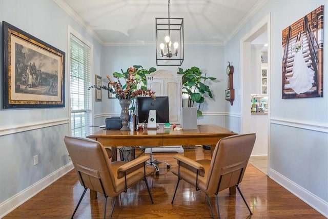 office area with crown molding, wood finished floors, and baseboards