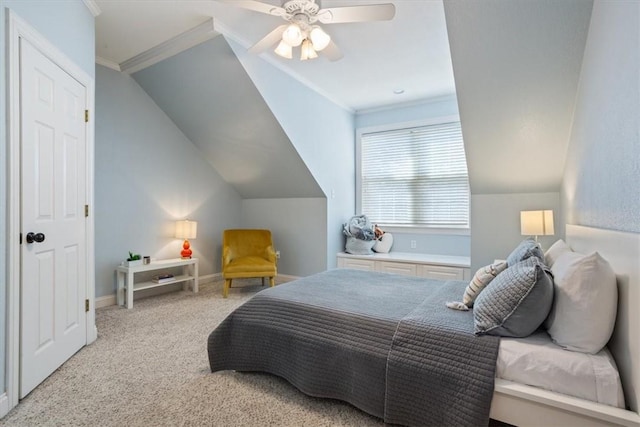 bedroom with baseboards, ceiling fan, carpet flooring, and vaulted ceiling