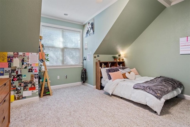 bedroom with carpet flooring, crown molding, and baseboards