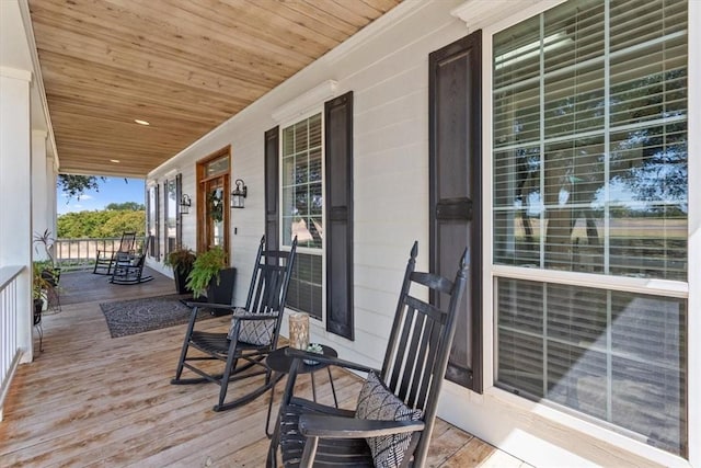 wooden deck featuring covered porch