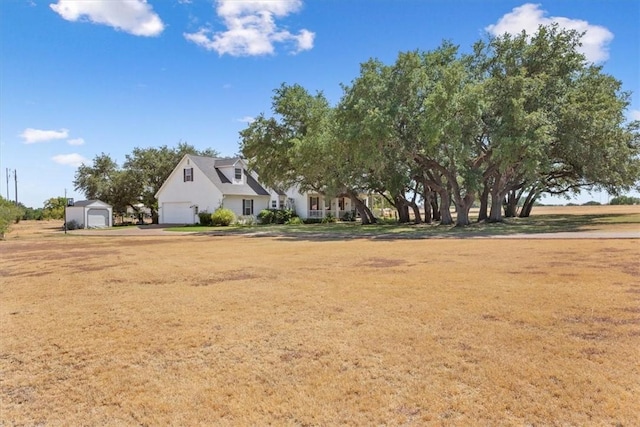 view of yard with a garage