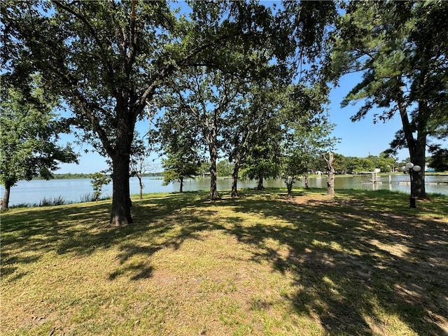 view of yard with a water view