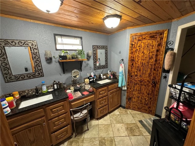 bathroom with vanity, wood ceiling, and ornamental molding