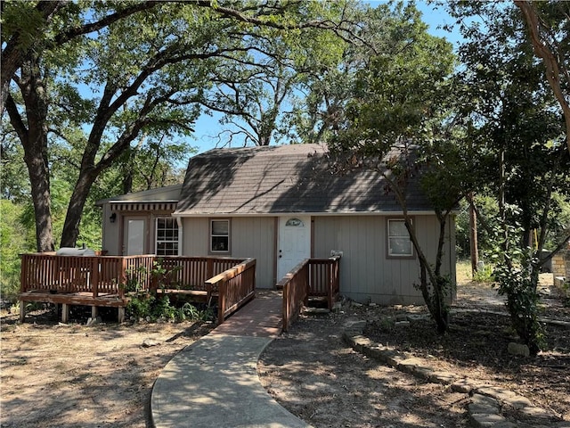 view of front of house featuring a wooden deck