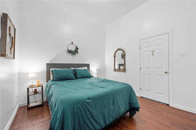 bedroom featuring dark hardwood / wood-style floors