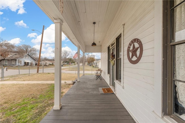 wooden terrace featuring a porch