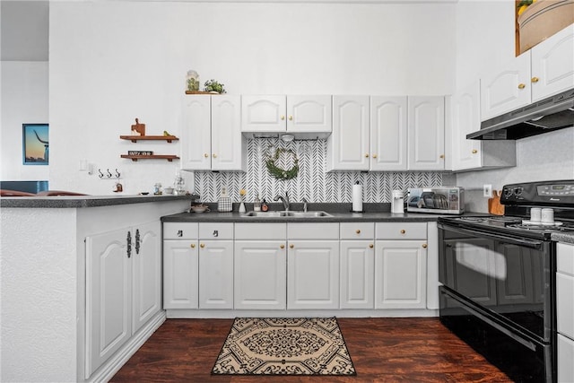 kitchen with sink, backsplash, black / electric stove, and white cabinetry