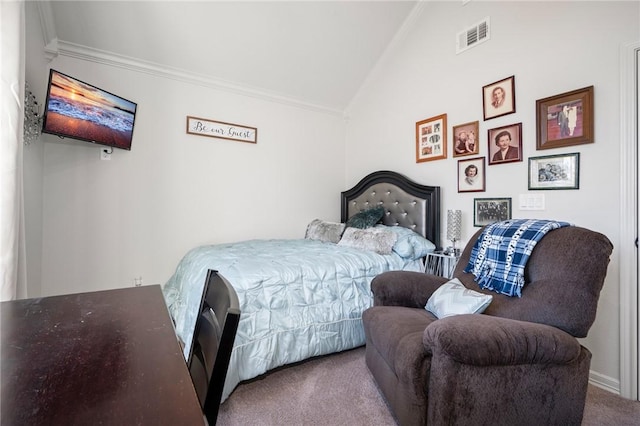 carpeted bedroom with vaulted ceiling and ornamental molding