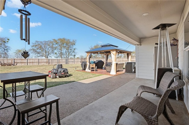 view of patio with a gazebo and central AC