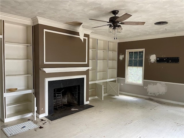 unfurnished living room with ceiling fan and ornamental molding