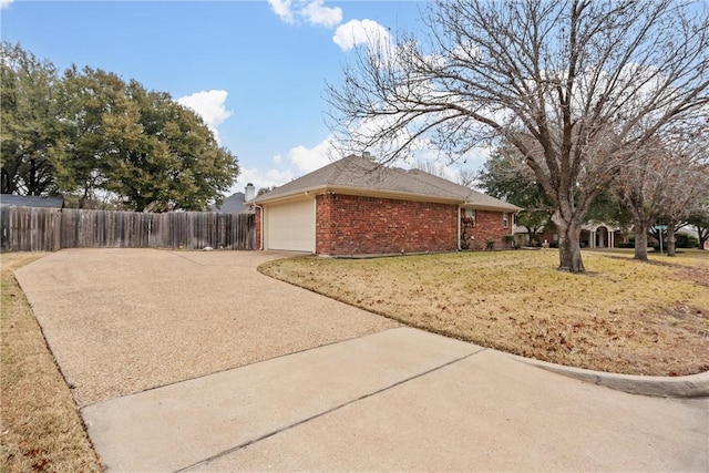 view of property exterior with a garage