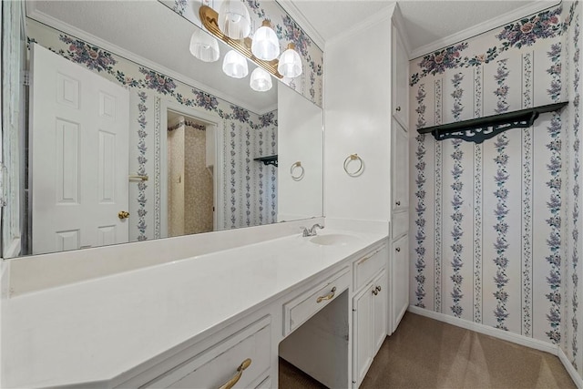 bathroom featuring crown molding and vanity