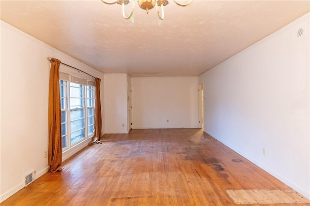 empty room featuring hardwood / wood-style floors