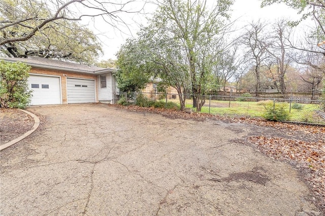 view of yard featuring a garage