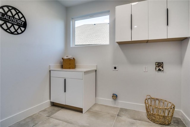 washroom with light tile patterned floors and electric dryer hookup