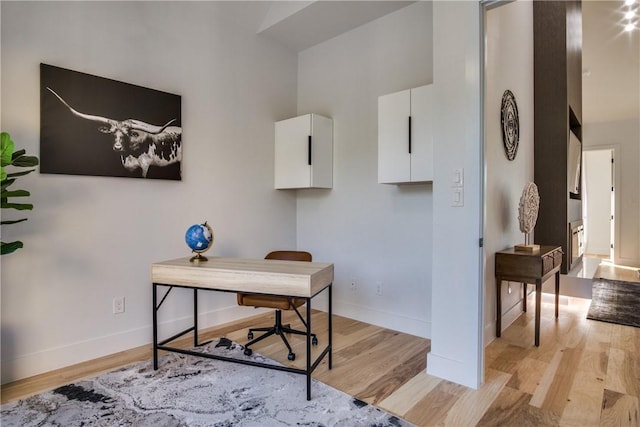 home office featuring light hardwood / wood-style flooring