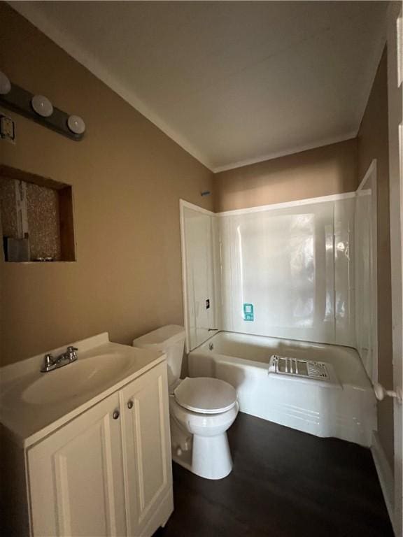 full bathroom featuring shower / tub combination, vanity, hardwood / wood-style flooring, and toilet