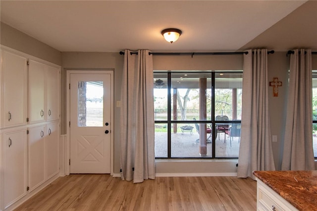 doorway to outside featuring light hardwood / wood-style flooring