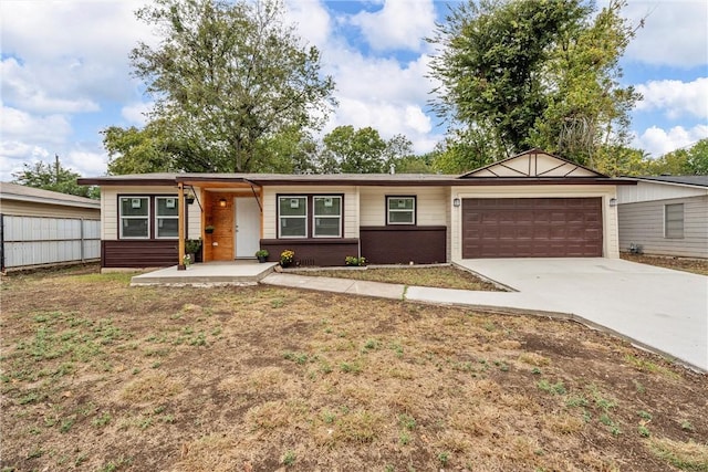 ranch-style house featuring a garage