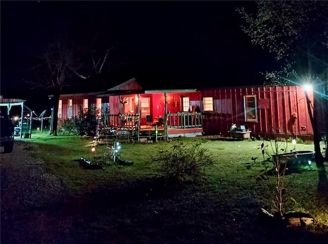 view of back of house at twilight