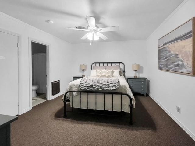 carpeted bedroom with ensuite bath, ceiling fan, and crown molding