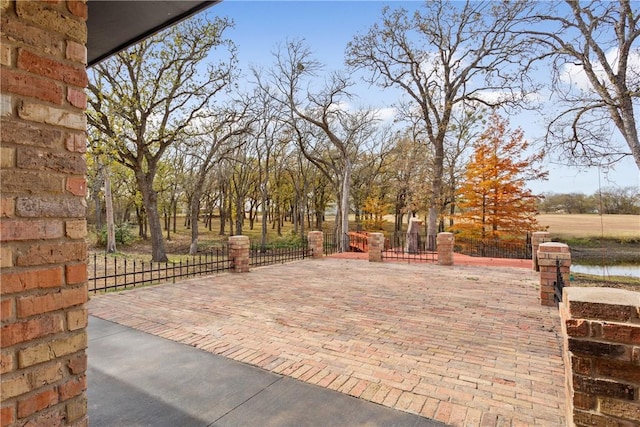 view of patio / terrace featuring a water view