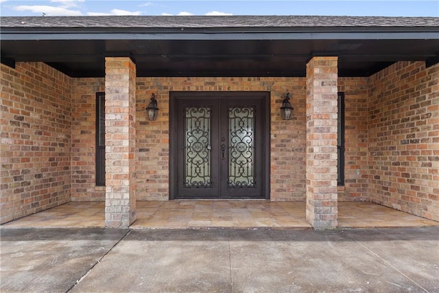 doorway to property featuring french doors