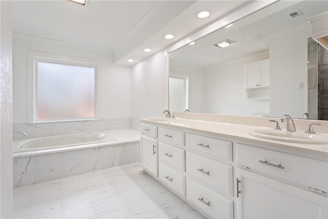 bathroom featuring vanity, a relaxing tiled tub, and crown molding