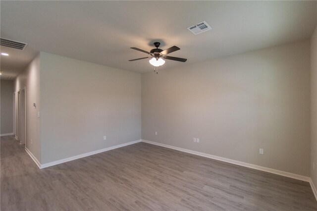 entrance foyer featuring ceiling fan and dark wood-type flooring