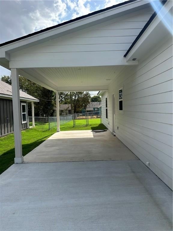 view of patio / terrace featuring a carport