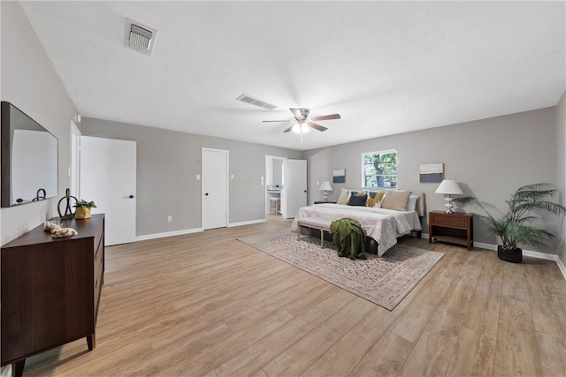 bedroom featuring light hardwood / wood-style floors and ceiling fan