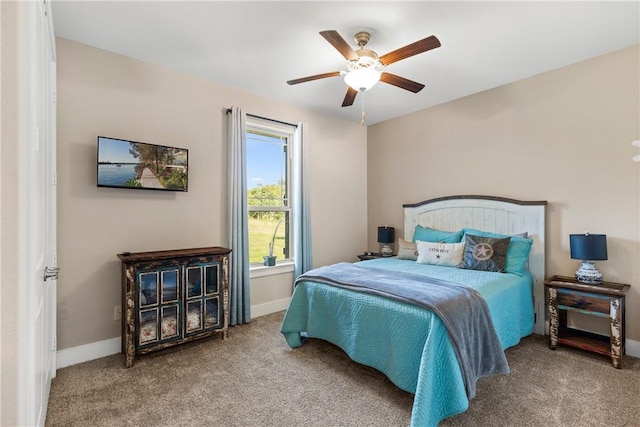 bedroom featuring ceiling fan and carpet flooring