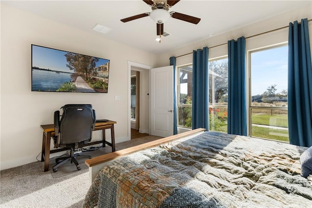 carpeted bedroom featuring ceiling fan