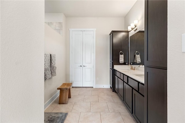 bathroom with vanity and tile patterned flooring