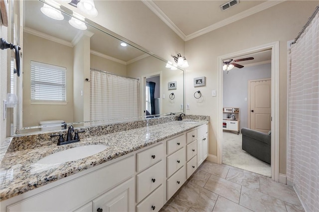 full bath featuring a sink, visible vents, double vanity, and crown molding