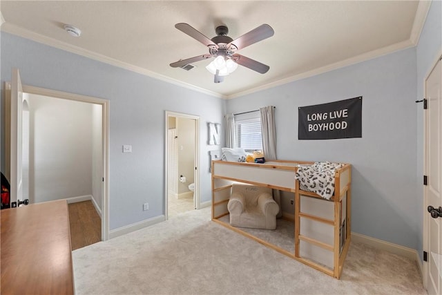 office featuring crown molding, baseboards, and ceiling fan