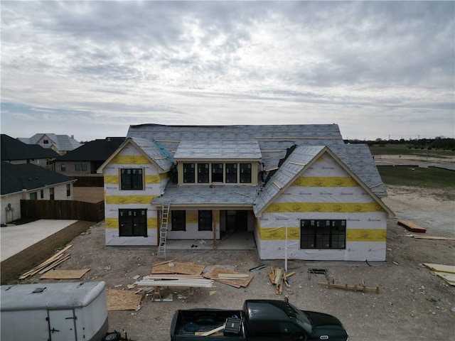 property under construction with a patio and fence