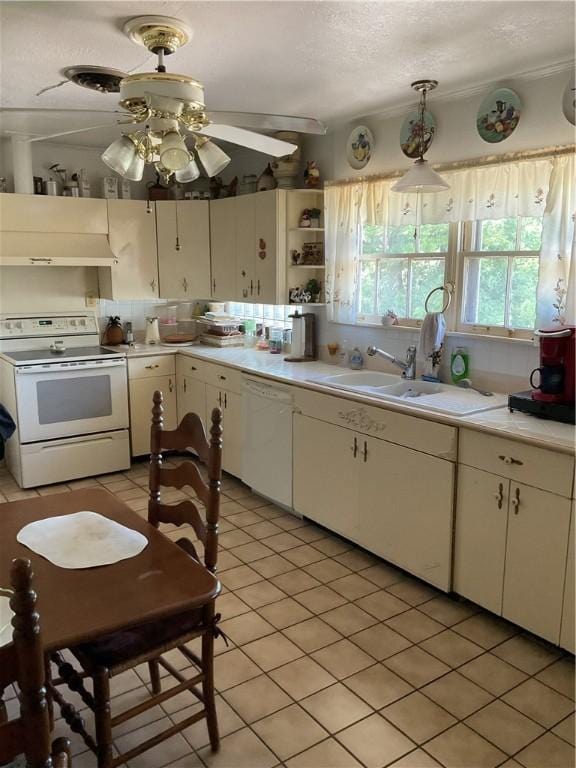 kitchen with white cabinetry, ceiling fan, sink, white appliances, and exhaust hood