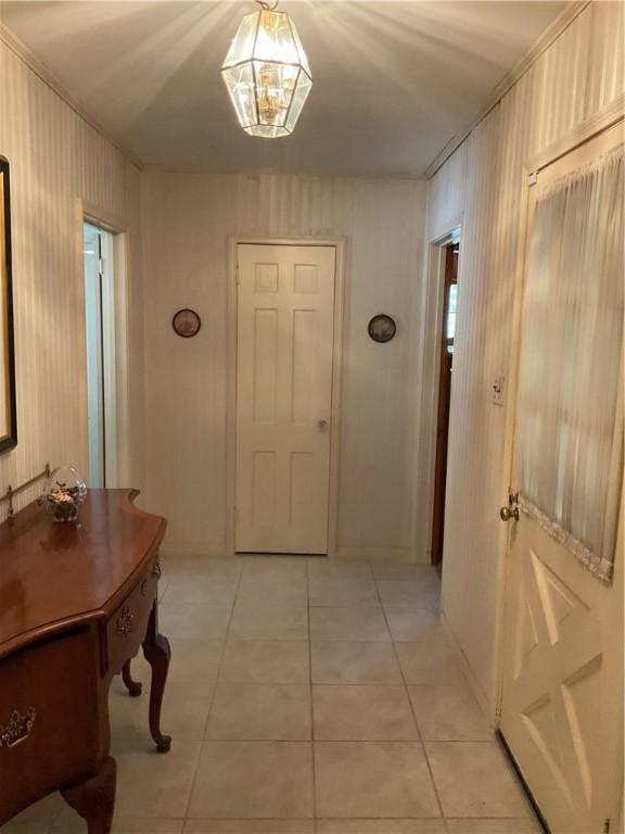 corridor featuring light tile patterned floors