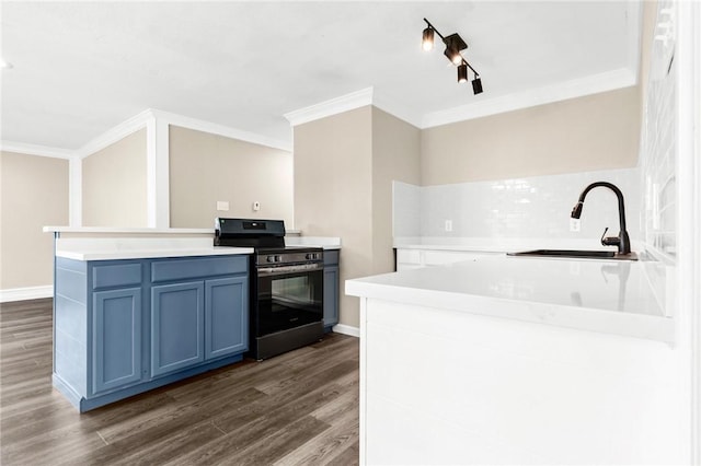 kitchen with blue cabinets, sink, dark hardwood / wood-style floors, ornamental molding, and black gas range oven