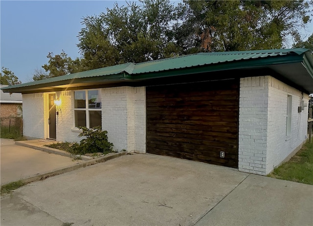 view of side of property featuring a patio area