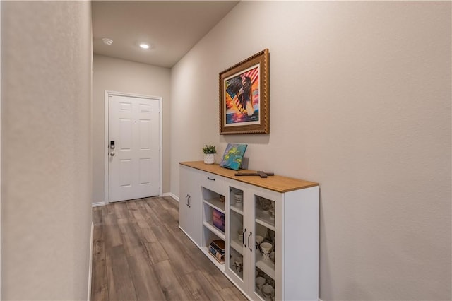 hall featuring hardwood / wood-style floors