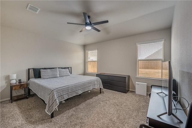 carpeted bedroom featuring ceiling fan