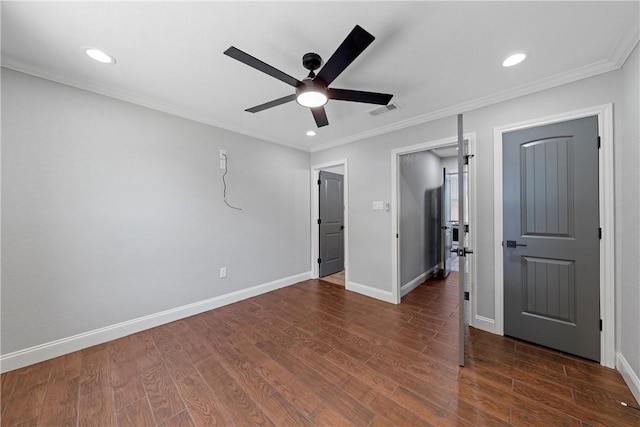 unfurnished bedroom featuring ceiling fan, crown molding, and dark wood-type flooring