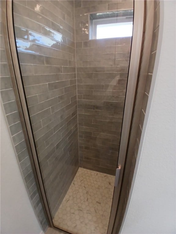 bathroom with an enclosed shower