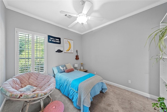 bedroom featuring light carpet, ceiling fan, and crown molding