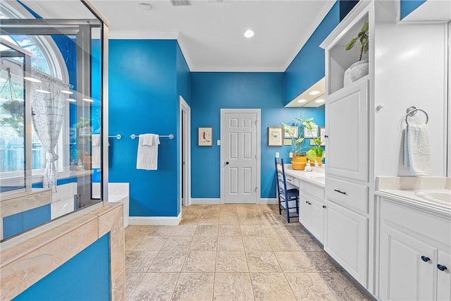 bathroom with vanity, an enclosed shower, and ornamental molding